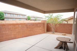 Fenced backyard featuring a patio area