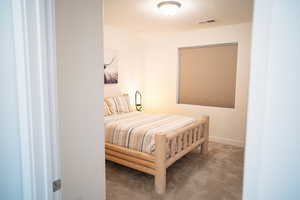 Bedroom featuring carpet