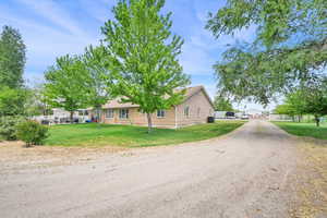 View of property exterior with brick siding