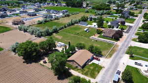 Aerial overview of property's location with nearby suburban area