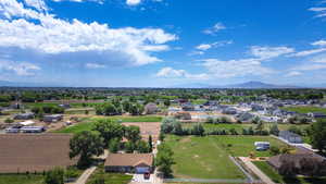 Aerial view of residential area featuring a mountain backdrop