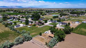 View of property location featuring a mountainous background and nearby suburban area