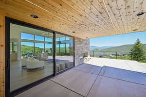 View of patio with a mountain view