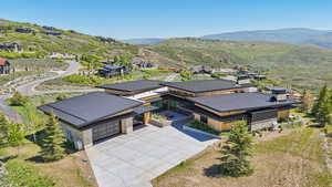 View of subject property with mountains