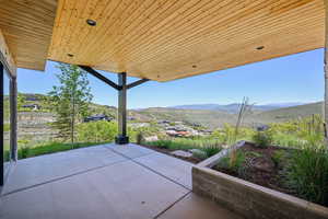 View of patio with a mountain view