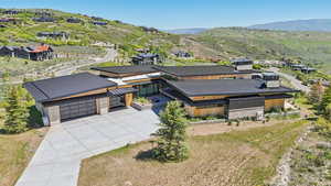 View of subject property featuring a mountain backdrop