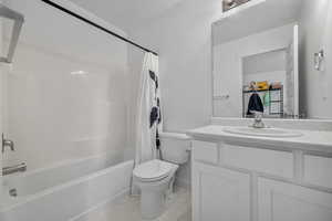 Full bathroom featuring vanity and shower / bath combo
