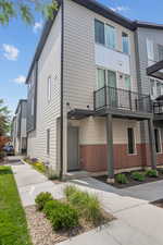 View of side of property with brick siding