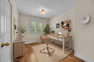 Office with wood finished floors