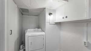 Laundry area featuring cabinet space and washer hookup