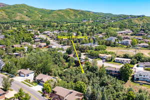 Aerial perspective of suburban area with mountains