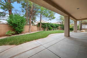 Fenced backyard featuring a patio area