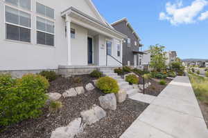 View of exterior entry with a residential view