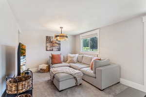 Living area featuring baseboards