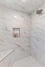 Bathroom with a tile shower