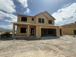 Property in mid-construction with driveway