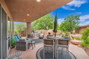 View of patio featuring outdoor dining area and exterior kitchen