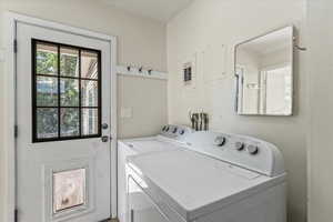 Laundry room featuring washer and dryer