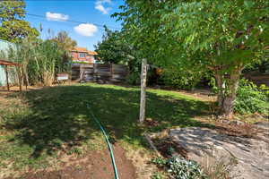 View of fenced backyard