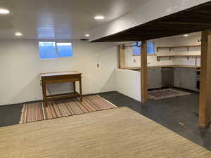 Basement featuring recessed lighting