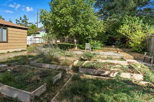 View of yard with a garden