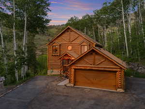 Log cabin featuring log exterior