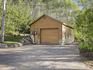 Detached 8 car garage with driveway.