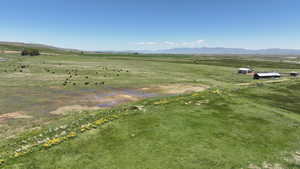 Overview of rural landscape with a mountainous background