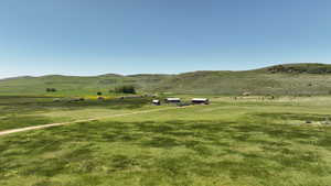 View of mountain background featuring rural landscape and agricultural land