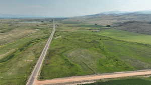 View of property location with rural landscape and mountains