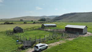 View of mountain background featuring rural landscape