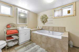 Basement Bathroom Featuring Jetted Tub