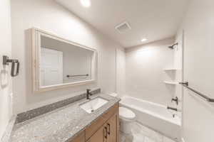 Full bathroom with vanity, shower / bath combination, recessed lighting, and tile patterned floors