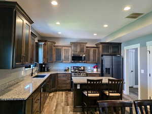 Everyone love an island and stainless steel appliances.
