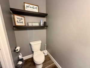 Half bath on main with floating shelves