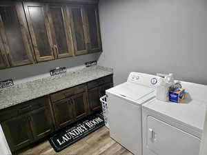 Oversized laundry upstairs by the bedrooms with added counter space and cabinets