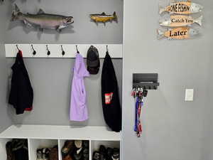 Organized utility area off the garage and kitchen and walk in pantry