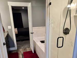Primary bedrooms bath separate tub & shower, cultured marble