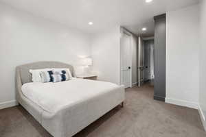 Bedroom featuring carpet flooring and recessed lighting