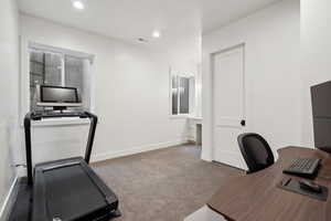 Unfurnished office with carpet floors and recessed lighting