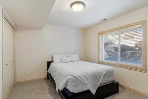 Bedroom featuring carpet flooring