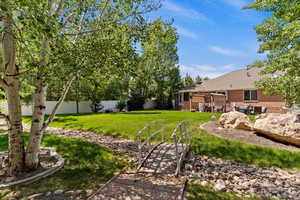 View of fenced backyard