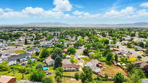 Aerial view of residential area featuring mountains
