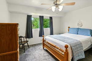 Bedroom with carpet floors and ceiling fan