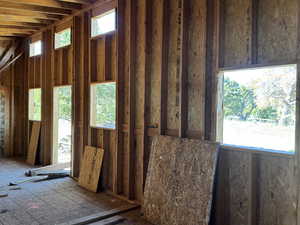 high ceilings in future bunkhouse  featuring plenty of natural light