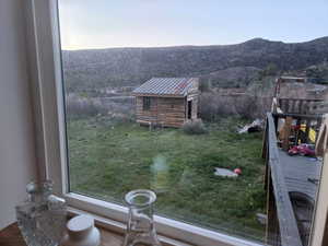 View of mountain backdrop whgile doing the kitchen dishes. Notice the many deer coming up the hill in your backyard?
