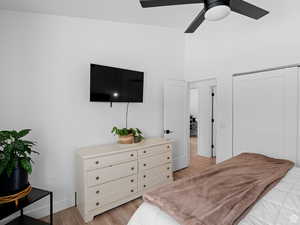 Bedroom featuring light wood finished floors and ceiling fan