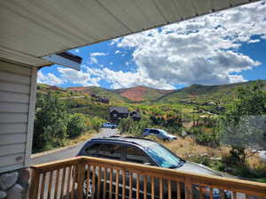 Mountain view from the front porch. All of this ito main road is your yard.