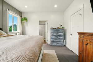 Bedroom featuring carpet and recessed lighting