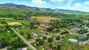 View of property location featuring a mountain backdrop and rural landscape